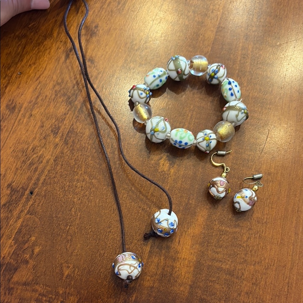 Gold and Brown Beaded Bracelet with Intricate Design